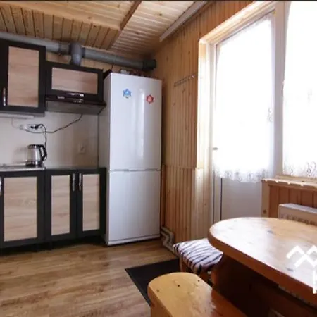 Landhuis на долоні